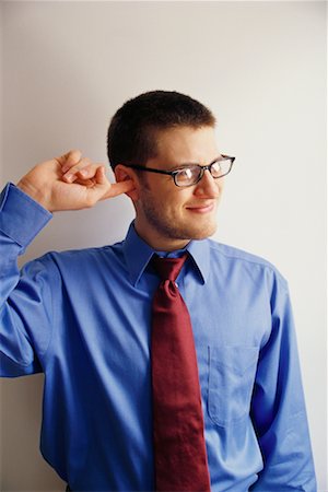 people itch scratch - Businessman Scratching His Ear Stock Photo - Rights-Managed, Code: 700-00365610