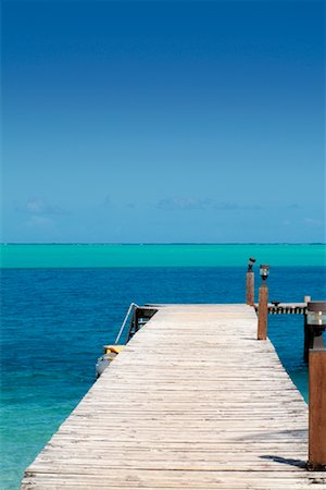 Jetty at Huahine Lagoon, French Polynesia Stock Photo - Rights-Managed, Code: 700-00365655