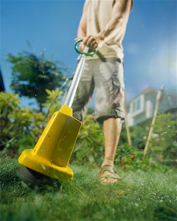 simsearch:700-01633321,k - Man Using a Grass Trimmer Stock Photo - Rights-Managed, Code: 700-00366056