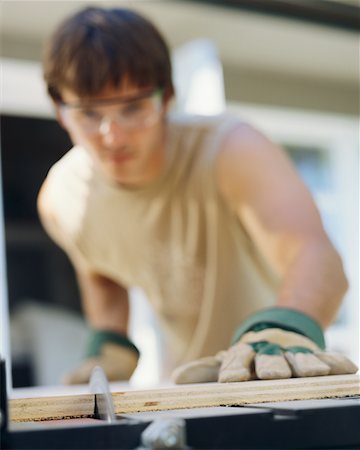 simsearch:700-00918582,k - Man Cutting Wood Stock Photo - Rights-Managed, Code: 700-00366066