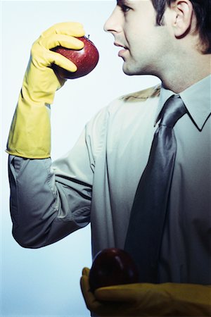 Businessman Eating Apple Stock Photo - Rights-Managed, Code: 700-00367525