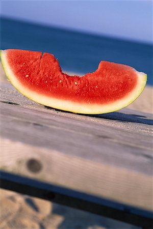 Watermelon Slice on Picnic Table Stock Photo - Rights-Managed, Code: 700-00367918
