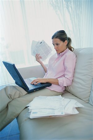 simsearch:700-00083403,k - Woman Working at Home Stock Photo - Rights-Managed, Code: 700-00361257