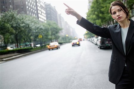 simsearch:700-00695782,k - Woman Hailing a Cab Stock Photo - Rights-Managed, Code: 700-00363884