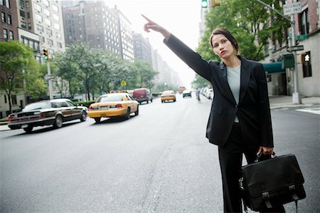 simsearch:700-00695782,k - Woman Hailing a Cab Stock Photo - Rights-Managed, Code: 700-00363886