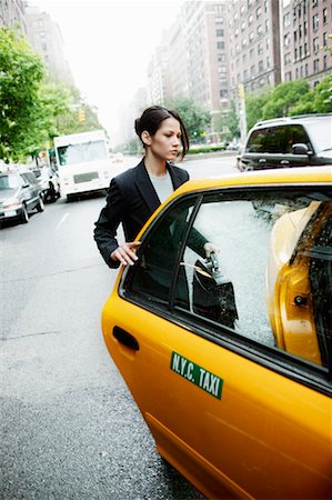 simsearch:700-00695782,k - Woman Getting into a Taxi Stock Photo - Rights-Managed, Code: 700-00363882