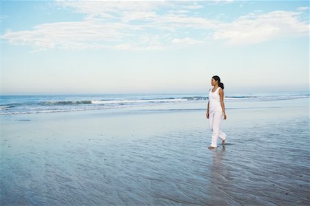 simsearch:700-00377960,k - Woman Walking on Beach Stock Photo - Rights-Managed, Code: 700-00377955