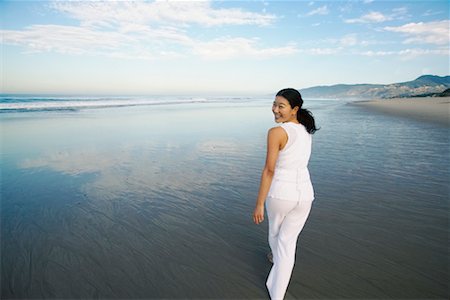 simsearch:700-00377960,k - Woman Walking on Beach Stock Photo - Rights-Managed, Code: 700-00377956