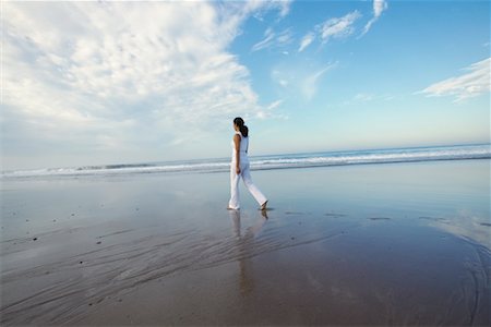 simsearch:700-00377960,k - Woman Walking on Beach Stock Photo - Rights-Managed, Code: 700-00377957