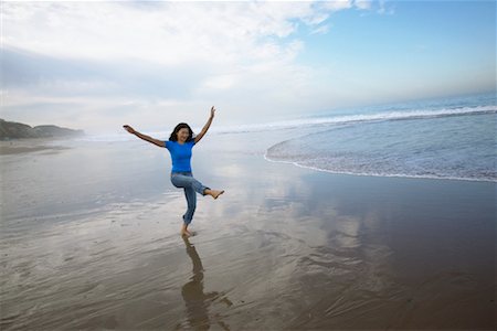 simsearch:700-00377960,k - Woman Dancing on Beach Stock Photo - Rights-Managed, Code: 700-00377961