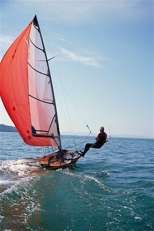 sail (fabric for transmitting wind) - Man Sailing Stock Photo - Rights-Managed, Code: 700-00378315
