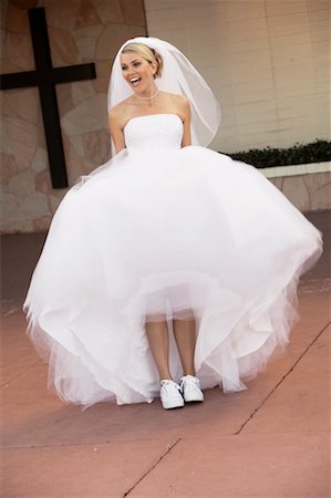 running shoes for the bride - Bride Wearing Running Shoes Stock Photo - Rights-Managed, Code: 700-00371278