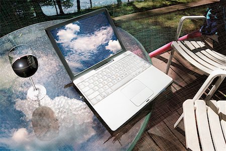 Laptop and Patio Furniture Stock Photo - Rights-Managed, Code: 700-00371841