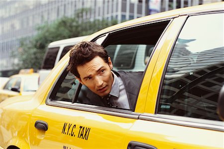 people in traffic jam - Businessman in Taxi Stock Photo - Rights-Managed, Code: 700-00371981