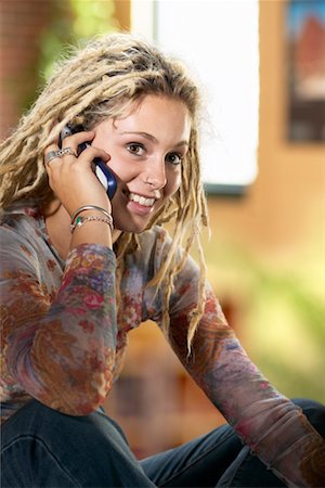 simsearch:600-03244230,k - Teen Girl with Dreads and Cell Phone Stock Photo - Rights-Managed, Code: 700-00424662