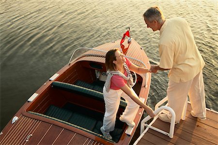 simsearch:700-00424852,k - Couple Getting Out of Boat Stock Photo - Rights-Managed, Code: 700-00424865