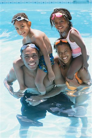 simsearch:700-00083447,k - Family in Swimming Pool Stock Photo - Rights-Managed, Code: 700-00425723