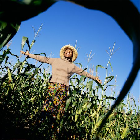 Portrait of Woman in Cornfield Stock Photo - Rights-Managed, Code: 700-00429623