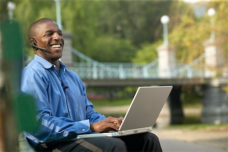 simsearch:700-00281308,k - Man Using Laptop in Urban Park Stock Photo - Rights-Managed, Code: 700-00429885