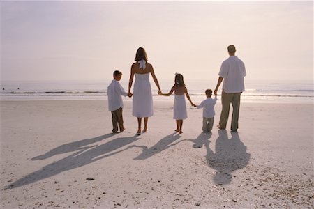simsearch:700-00073572,k - Family Holding Hands at The Beach Stock Photo - Rights-Managed, Code: 700-00439160