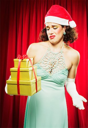 simsearch:700-00795365,k - Woman Sneering at Gifts Stock Photo - Rights-Managed, Code: 700-00439500