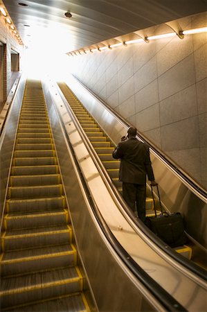 simsearch:700-00281308,k - Businessman on Escalator Stock Photo - Rights-Managed, Code: 700-00439657