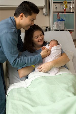 filipina mother daughter - Man Visiting Wife and Newborn Baby Stock Photo - Rights-Managed, Code: 700-00458239