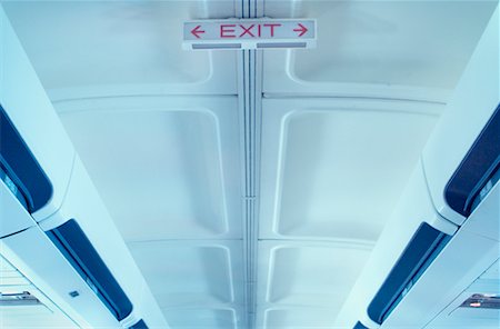 Exit Sign in Airplane Cabin Stock Photo - Rights-Managed, Code: 700-00459649