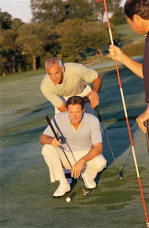 simsearch:6113-07159316,k - Three Men Golfing Stock Photo - Rights-Managed, Code: 700-00459723