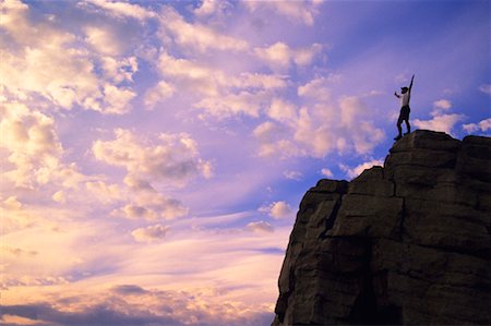 silhouette of man standing in a mountain top - Mountain Climber at Summit Stock Photo - Rights-Managed, Code: 700-00459952