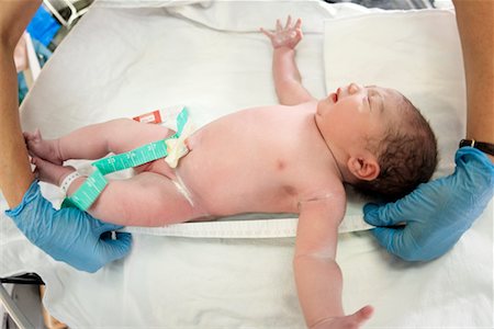 doctor with gloves with child - Newborn Being Measured Stock Photo - Rights-Managed, Code: 700-00452659