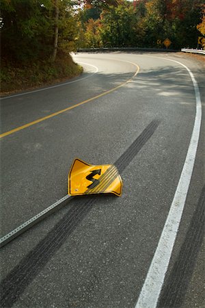 skid marks - Road and Street Sign with Tire Track Stock Photo - Rights-Managed, Code: 700-00452650