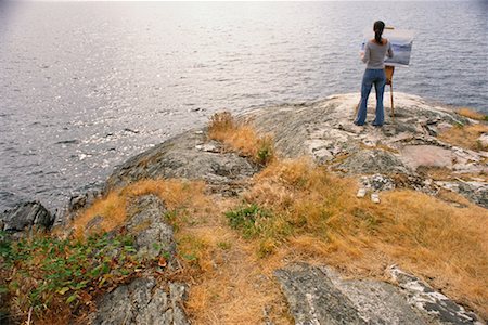 secluded lake woman - Woman Painting by Water Stock Photo - Rights-Managed, Code: 700-00453520