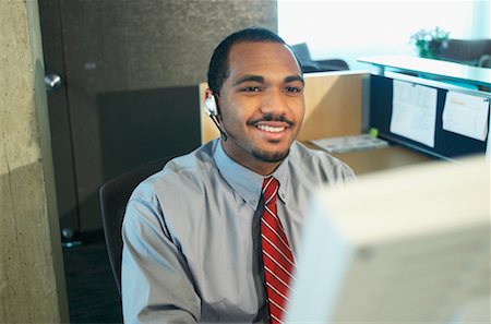 simsearch:700-00045560,k - Businessman with Telephone Headset Stock Photo - Rights-Managed, Code: 700-00477336