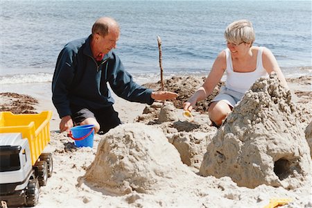 simsearch:700-00477489,k - Couple Building Sandcastle Stock Photo - Rights-Managed, Code: 700-00477507