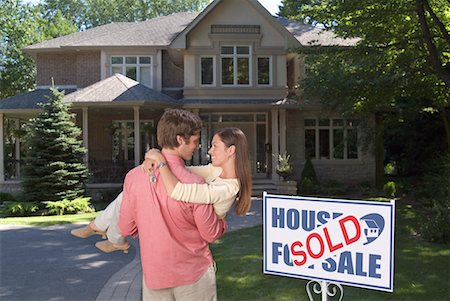 sold sign - Man Carrying Woman to Newly Purchased Home Stock Photo - Rights-Managed, Code: 700-00477564