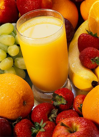simsearch:824-07586355,k - Glass of Orange Juice and Mixed Fruit Stock Photo - Rights-Managed, Code: 700-00477645