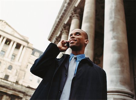 simsearch:700-00281308,k - Businessman Using Cell Phone Stock Photo - Rights-Managed, Code: 700-00477750