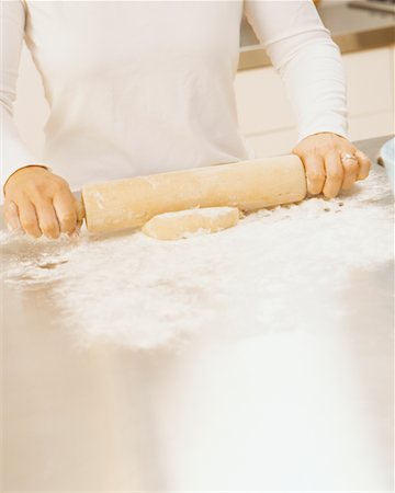 simsearch:649-06845217,k - Woman Rolling Dough Stock Photo - Rights-Managed, Code: 700-00478204