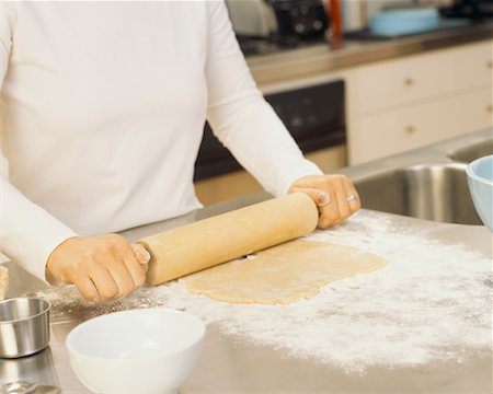 simsearch:649-06845217,k - Woman Rolling Dough Stock Photo - Rights-Managed, Code: 700-00478206