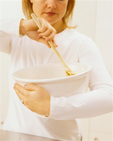 simsearch:649-06845217,k - Woman Stirring Cookie Batter Stock Photo - Rights-Managed, Code: 700-00478202