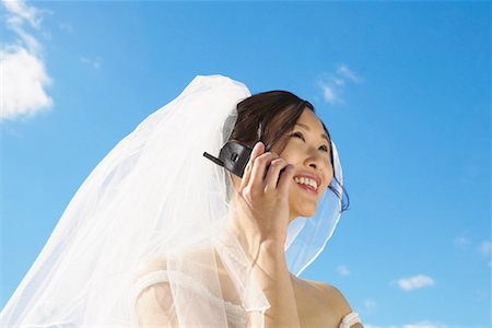 simsearch:700-00523247,k - Bride Talking On Cell Phone Stock Photo - Rights-Managed, Code: 700-00478736