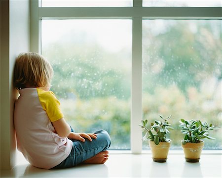 sad girl watch rain window - Girl Looking Out Window Stock Photo - Rights-Managed, Code: 700-00506856