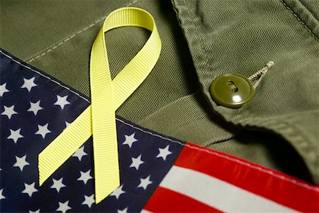 Yellow Ribbon on American Flag and Military Uniform Stock Photo - Rights-Managed, Code: 700-00507069