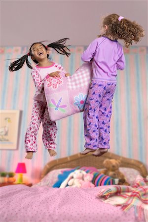 simsearch:700-00519358,k - Two Girls at a Sleepover, Jumping on the Bed Stock Photo - Rights-Managed, Code: 700-00514822