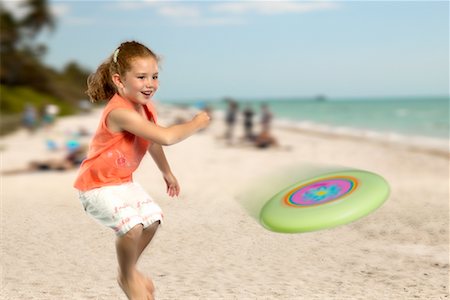 simsearch:700-01042880,k - Girl Playing Frisbee On the Beach Stock Photo - Rights-Managed, Code: 700-00514833