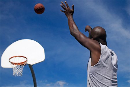 Man Playing Basketball Stock Photo - Rights-Managed, Code: 700-00515275