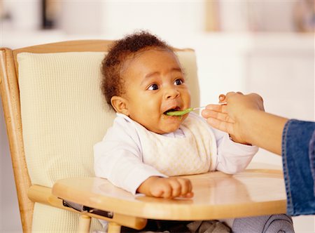 Mother Feeding Child Stock Photo - Rights-Managed, Code: 700-00517711