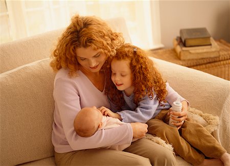 simsearch:700-00551400,k - Mother Feeding Baby with Daughter Stock Photo - Rights-Managed, Code: 700-00517732