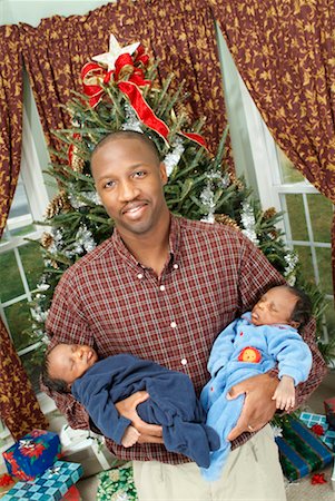 sibling newborn parent - Father With Newborn Twins at Christmas Stock Photo - Rights-Managed, Code: 700-00519100